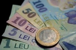 Ce modificări a suferit moneda națională după alegerile de ieri