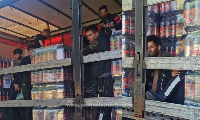 Migranți depistați de polițiștii de frontieră arădeni printre paleți de bere 