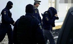 Polițist din vestul țării arestat sub acuzația de luare de mită de 41 de ori de la traficanți de țigări de contrabandă